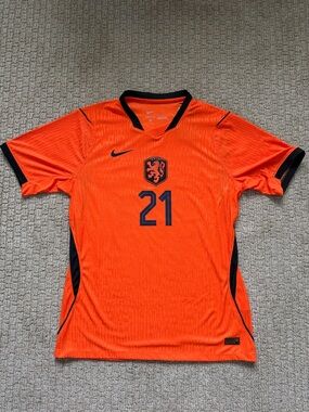 Men’s Nike Frenkie de Jong Orange Netherlands Soccer Jersey w/ Black Accents #21